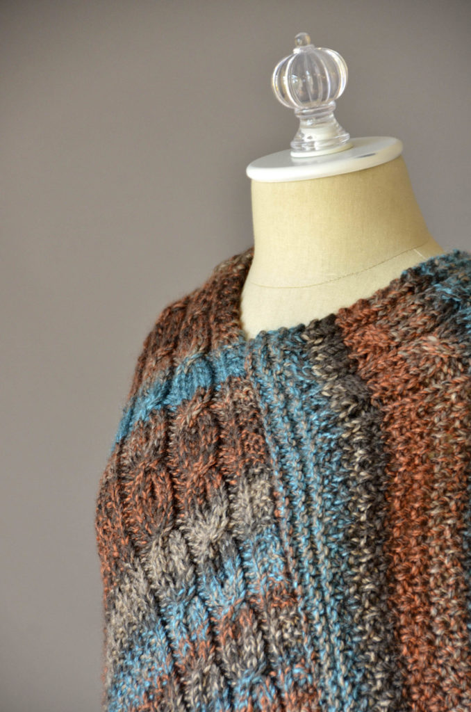 double-cable-poncho-three-quarter-detail-blog