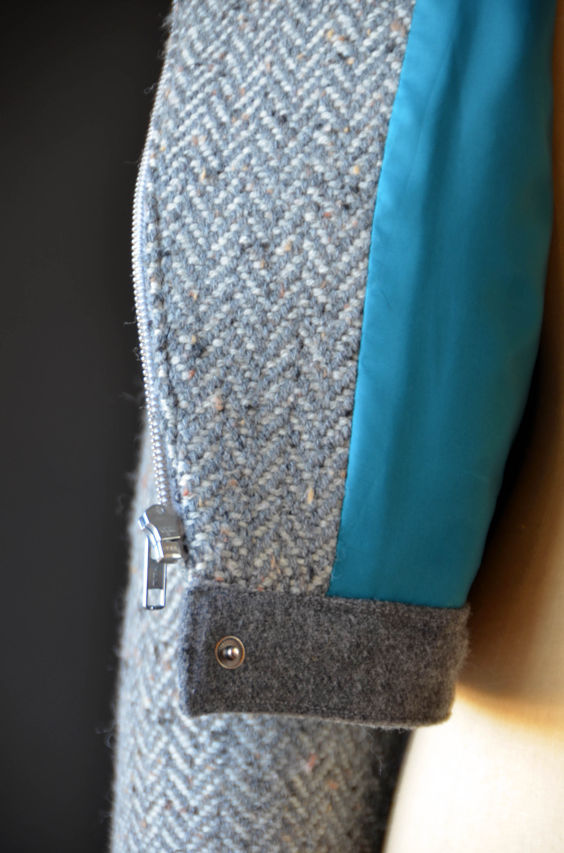 My pop of color is on the inside of my jacket in the form of teal lining. Mmmm.