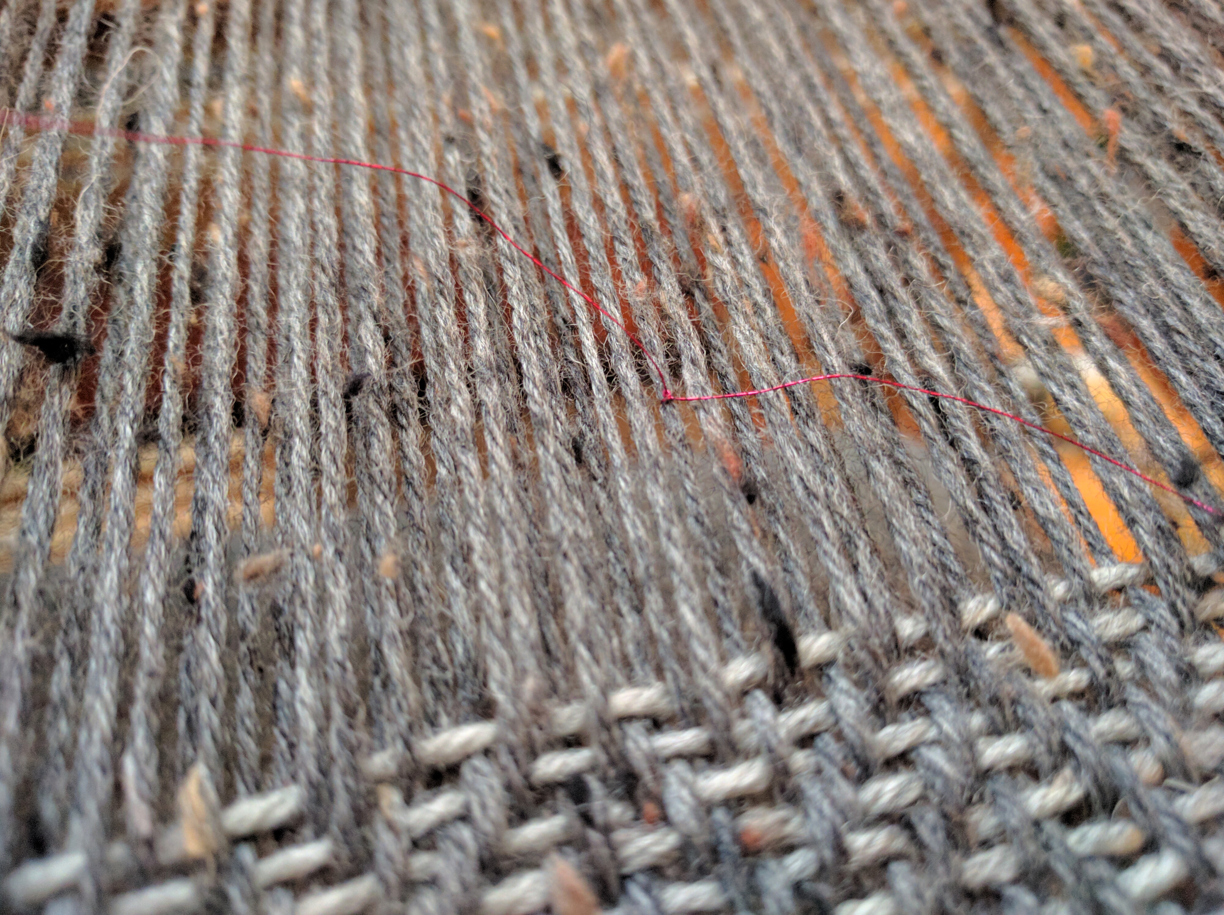 This contrasting thread tied to the some of the warp threads lets me know I'm at the halfway point.