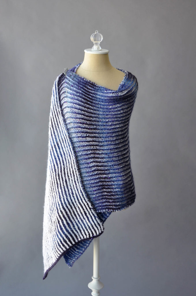 Blue and white brioche knit stole in Classic Shades Sequins Lite yarn