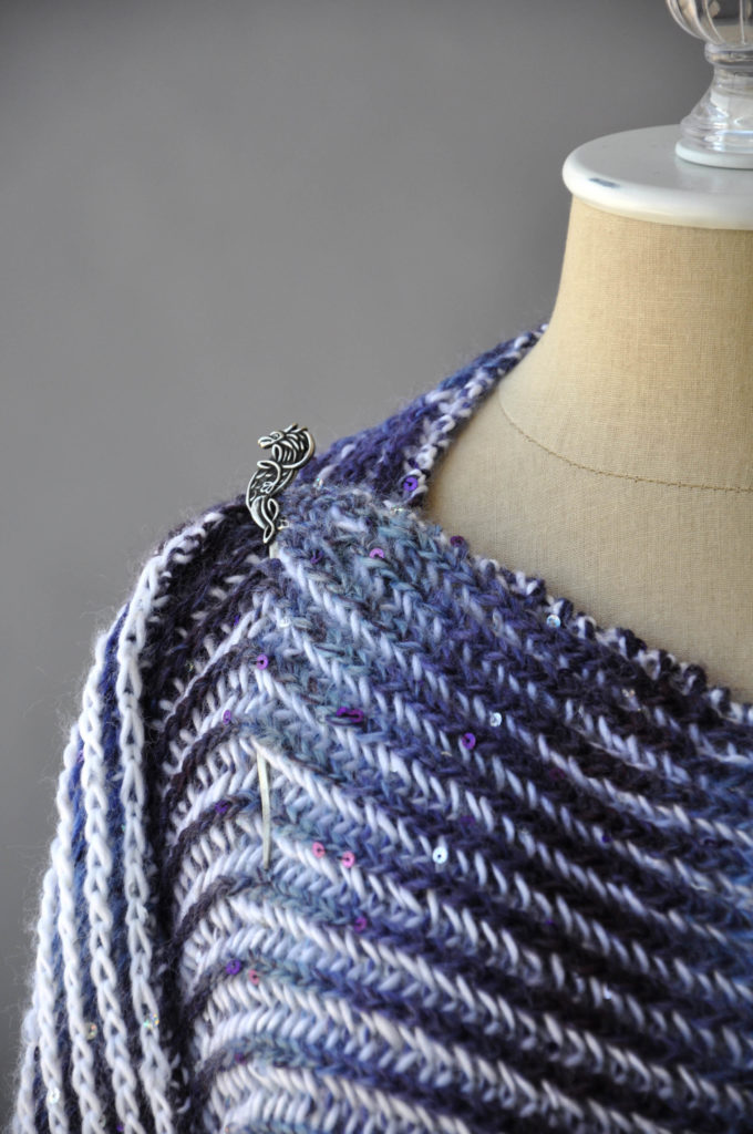 brioche knit fabric held in place by Jul Designs shawl pin