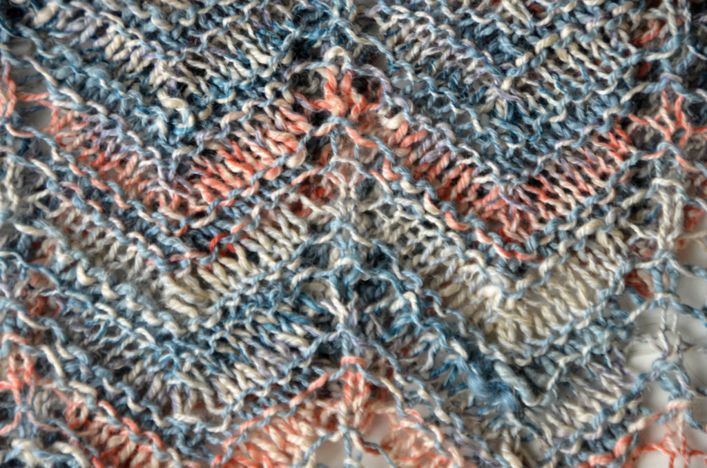 Closeup of chevron pattern in scarf knit in Unity yarn
