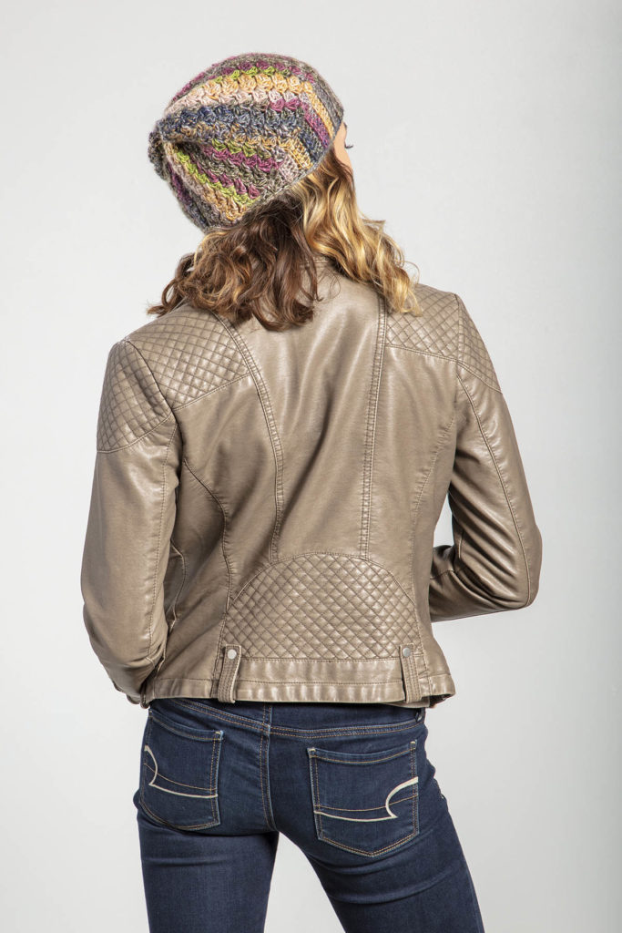 Rear view of woman wearing cap crocheted in Classic Shades Frenzy.