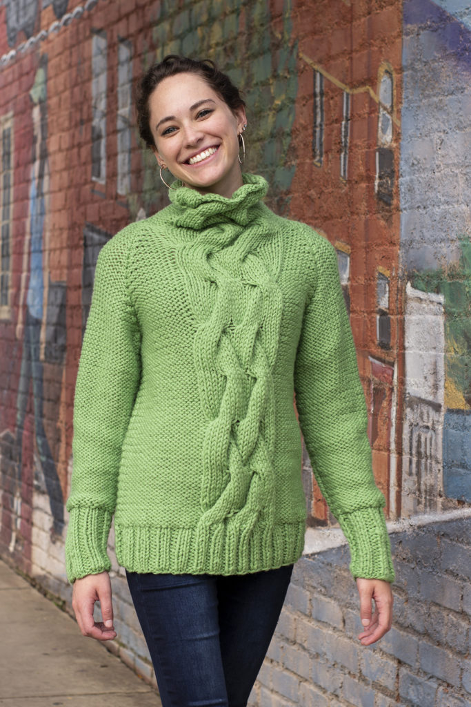 Thick green cabled pullover knit in Deluxe Bulky Superwash yarn