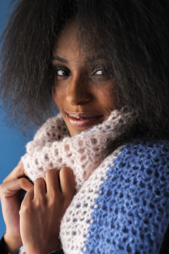 woman's face framed by crocheted March Fog stole in Alaska yarn