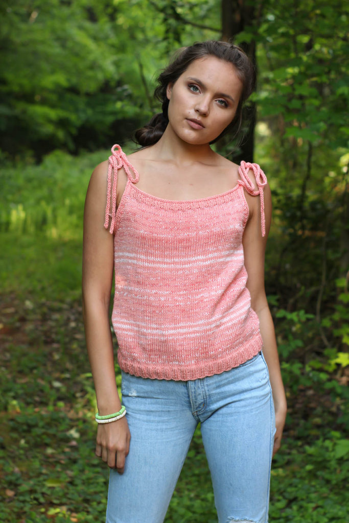 Young adult female wearing a tank knit from Cotton Supreme DK Seaspray.