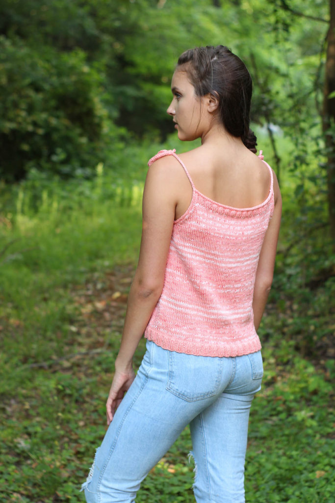 Young adult female wearing a tank top knit from Cotton Supreme DK Seaspray
