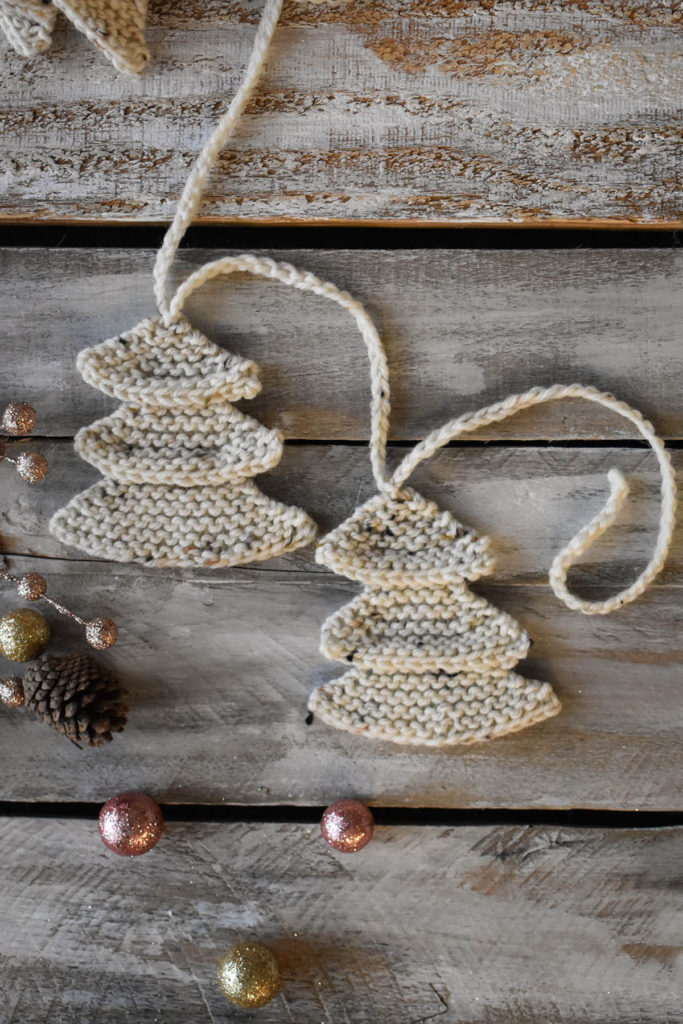 Two knit trees created using Universal Yarn Deluxe Worsted Tweed Superwash.