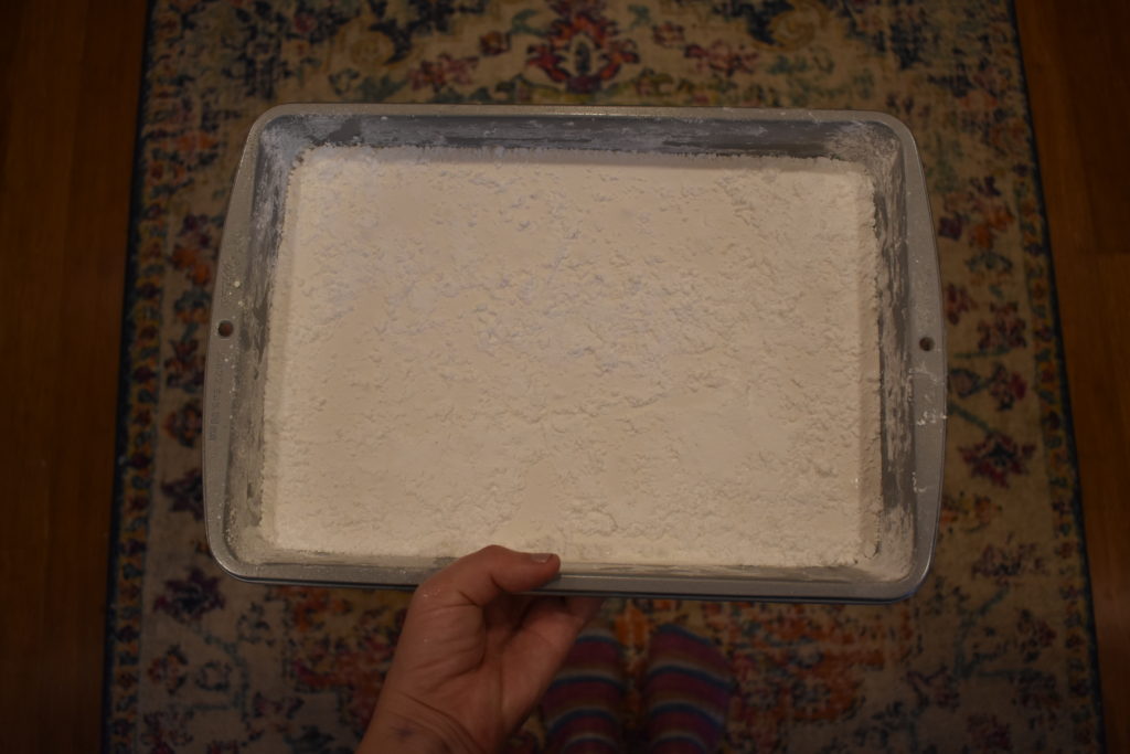 Marshmallows before cutting, in an 8x12 baking pan.