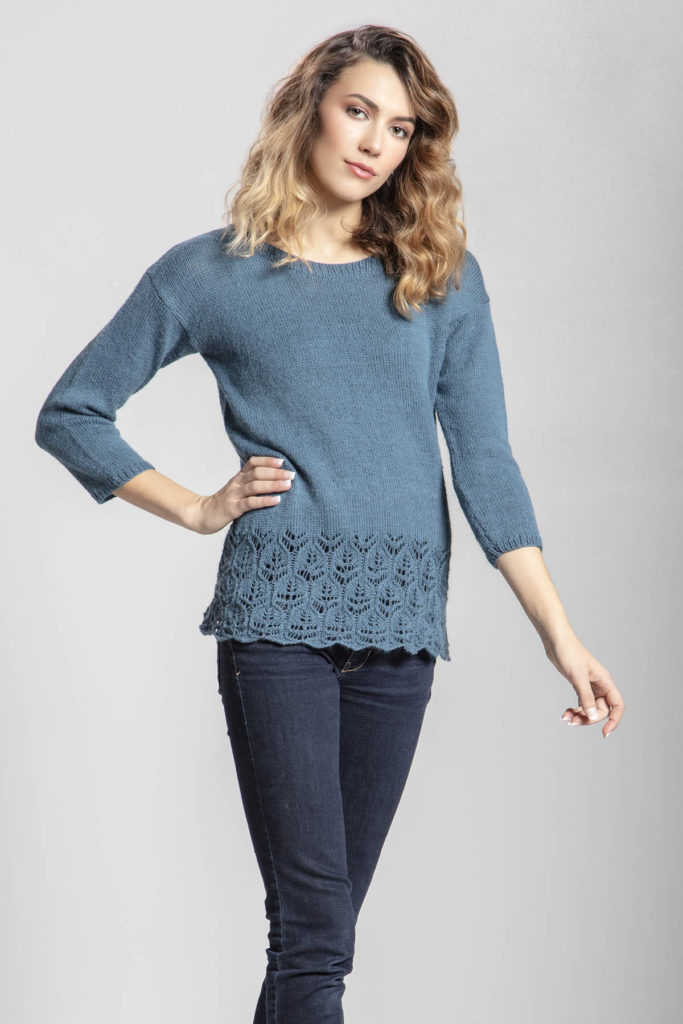 Image of woman wearing blue pullover knit in Angora Lace yarn