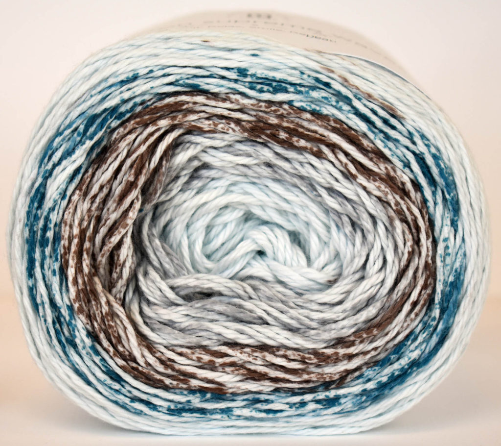 Ball of Cotton Supreme Waves yarn showing color stripes