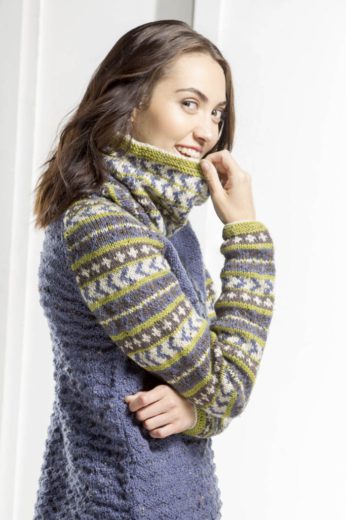 woman in blue pullover with Fair Isle sleeves