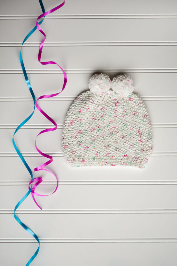 The Confetti Cap is a quick and easy knit for the little one in your life.  It takes just one ball of Bamboo Pop!