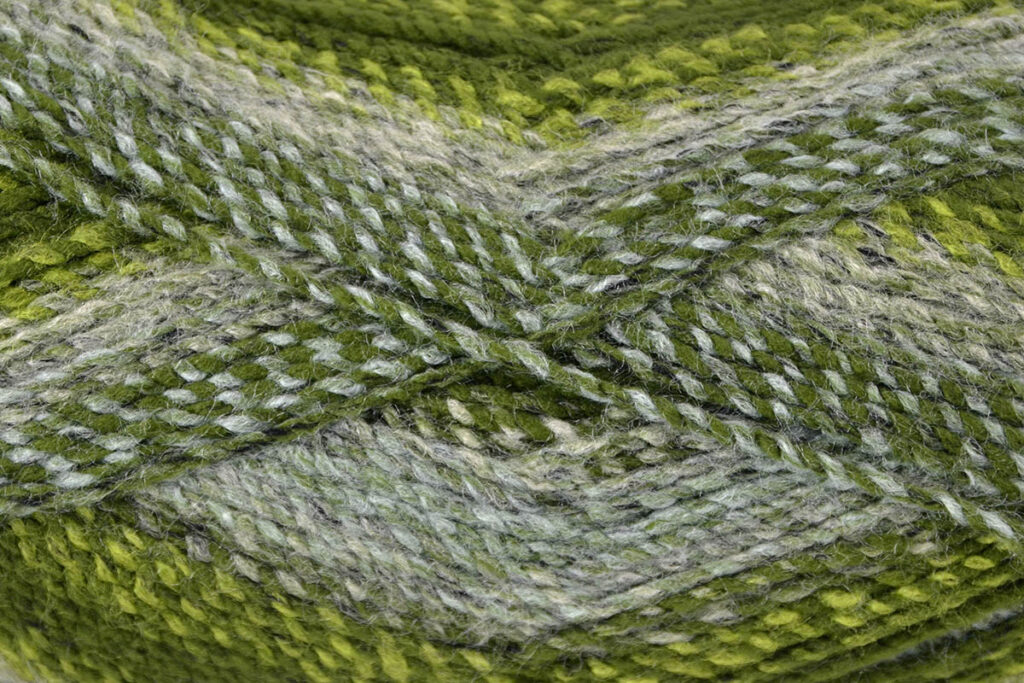 Variegated gray and green yarn swatch