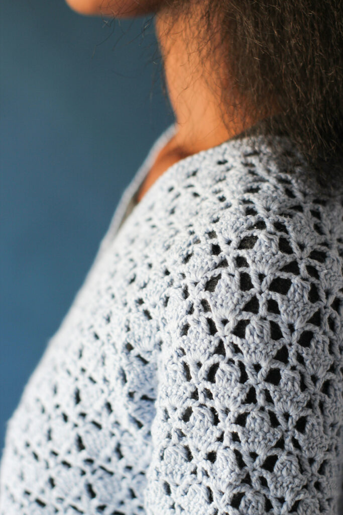 Closeup of crochet stitch pattern in Celeste poncho