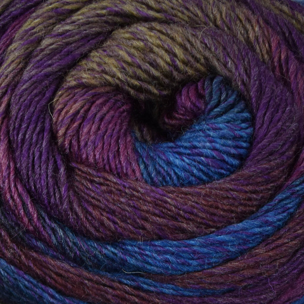 closeup image of ball of purple and blue Colorburst yarn color 112