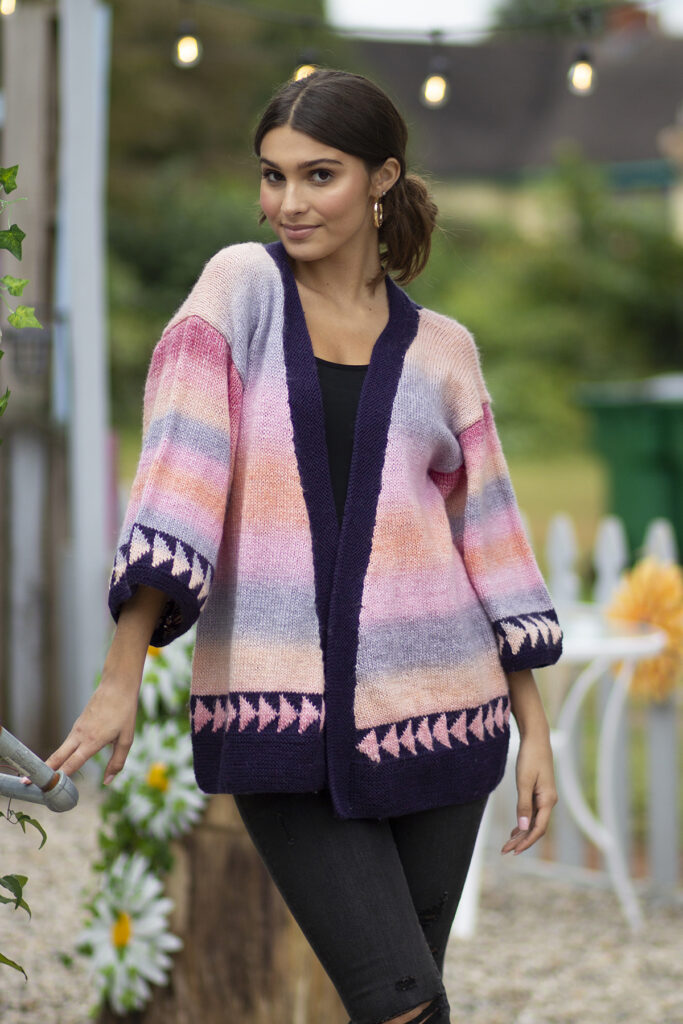 Photo of a person wearing the Slant cardigan facing forward