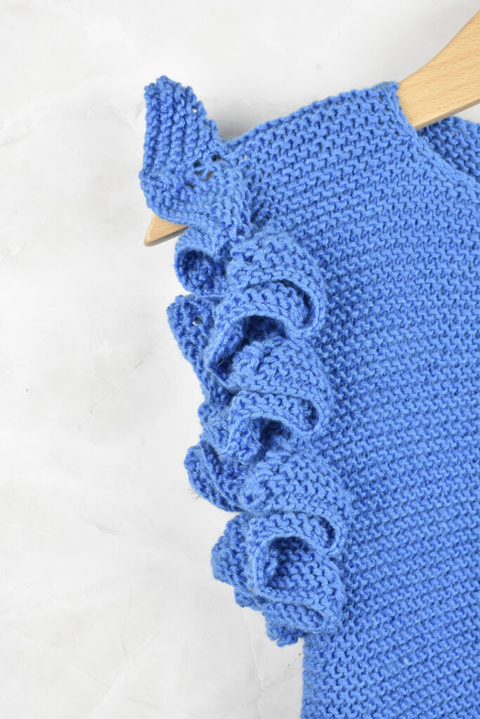 Close-up photo of the ruffle sleeves on the Cloudborn Cardigan