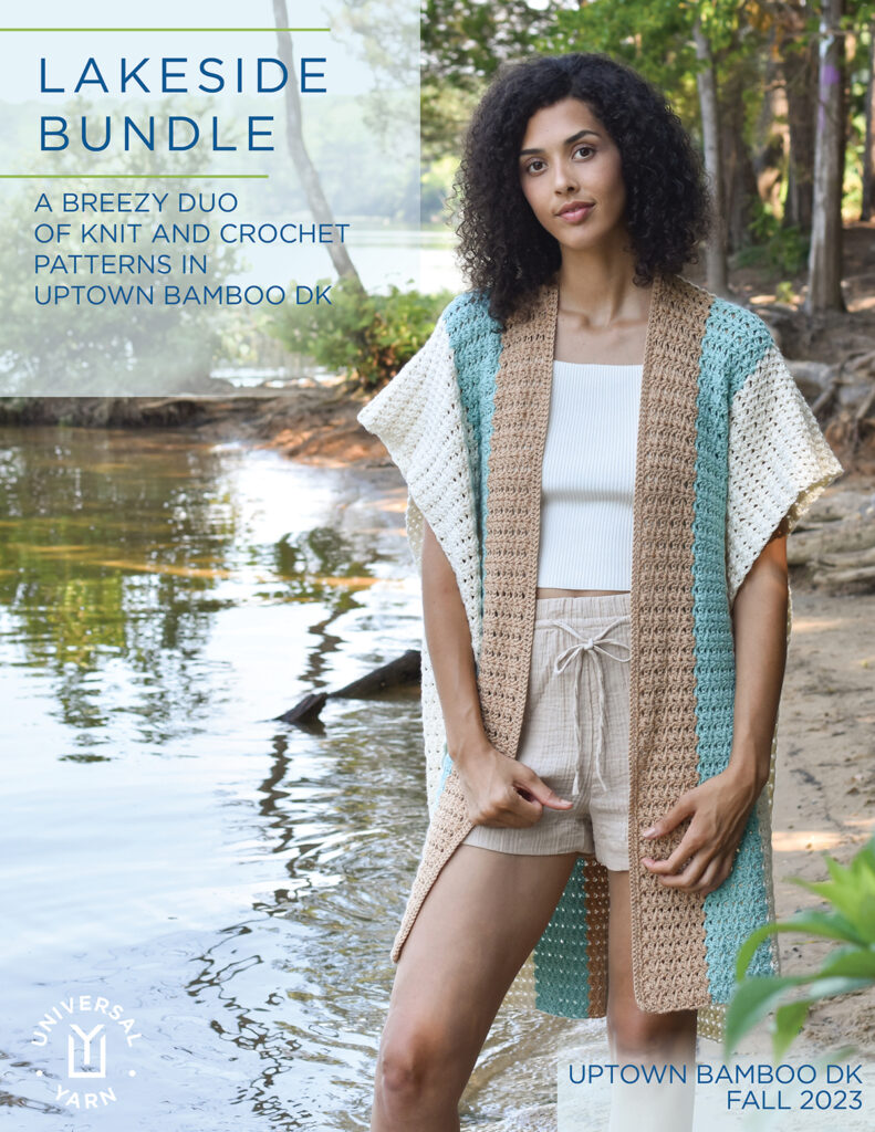 The cover of the ebook, Lakeside Bundle. It features text that reads: "Lakeside Bundle: A Breezy Due of Knit and Crochet Patterns in Uptown Bamboo DK". The Universal Yarn logo is in the lower left corner, and in the lower right corner text reads "Uptown Bamboo DK, Fall 2023". A woman stands on the right side/center of the photo and wears the crocheted Subtle Shell Ruana. 